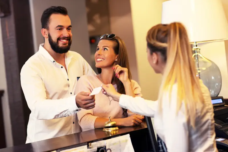 Man and woman making a down payment via Xootle POS
